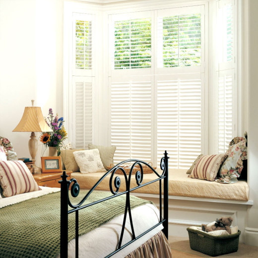 Custom Plantation Shutters on Bay Window of Bedroom